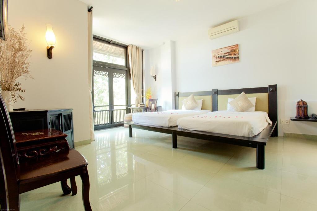 Faifoo Boutique Hotel Cidade de Ho Chi Minh Quarto foto